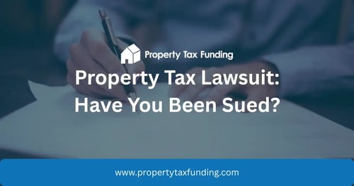 Featured image for Property Tax Funding’s blog post Property Tax Lawsuit: Have You Been Sued? showing a person signing paperwork.
